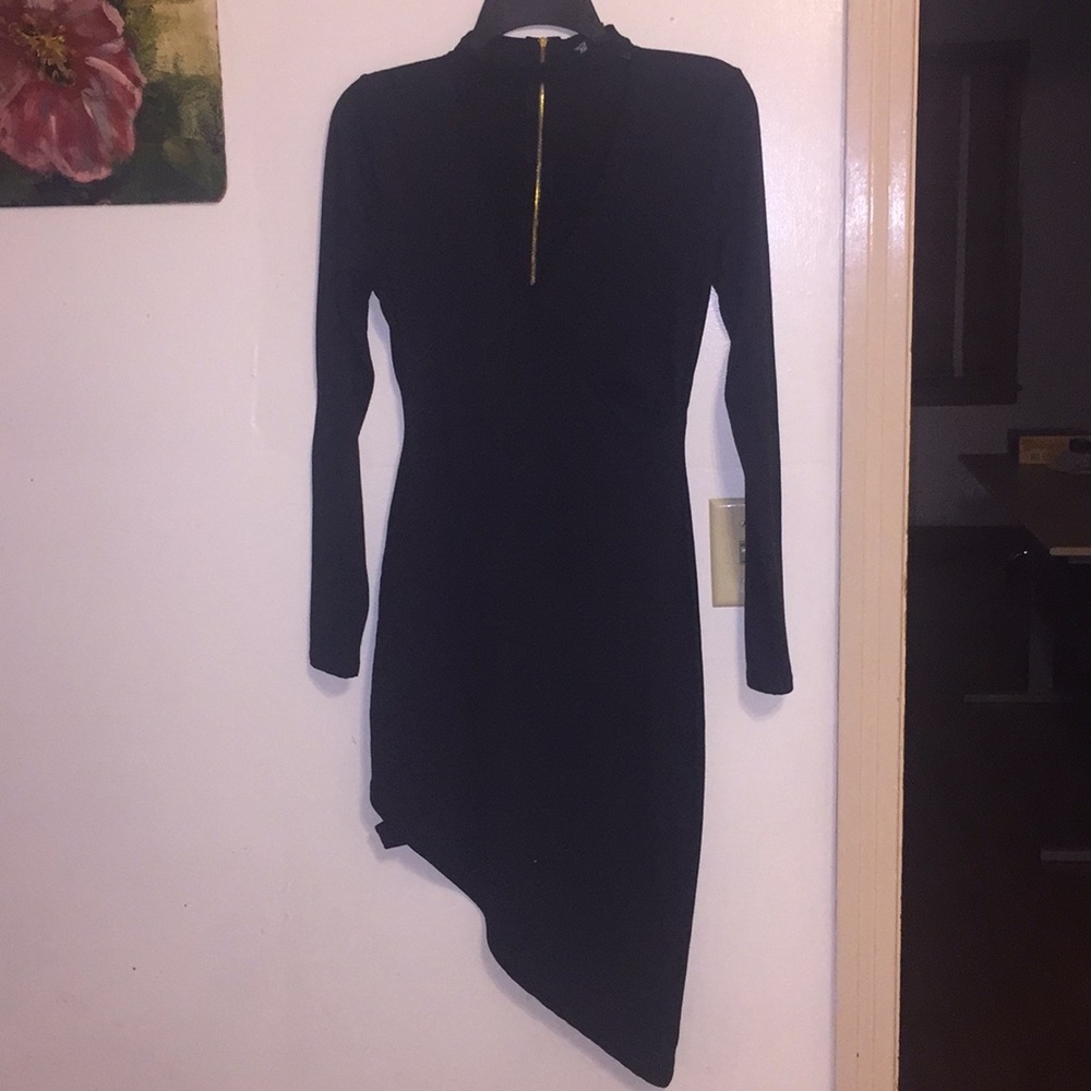 Elegant black dress.. asymmetrical bottom.